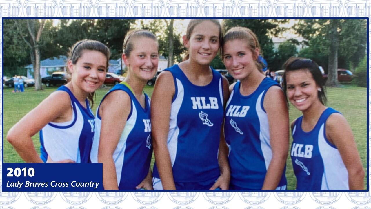 Cross country members pause for a photo.